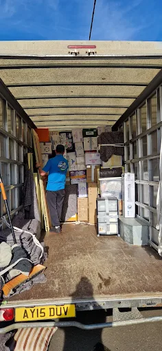 Sm_Removals_employee_Loading_in_Truck.webp